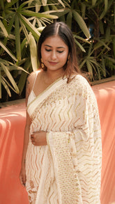 Aureate play (Saree)